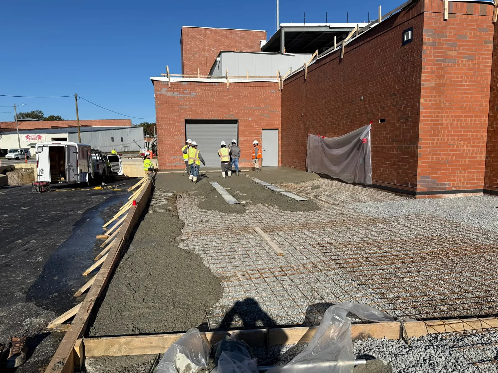 Rebar grid set for a commercial slab with the pour starting