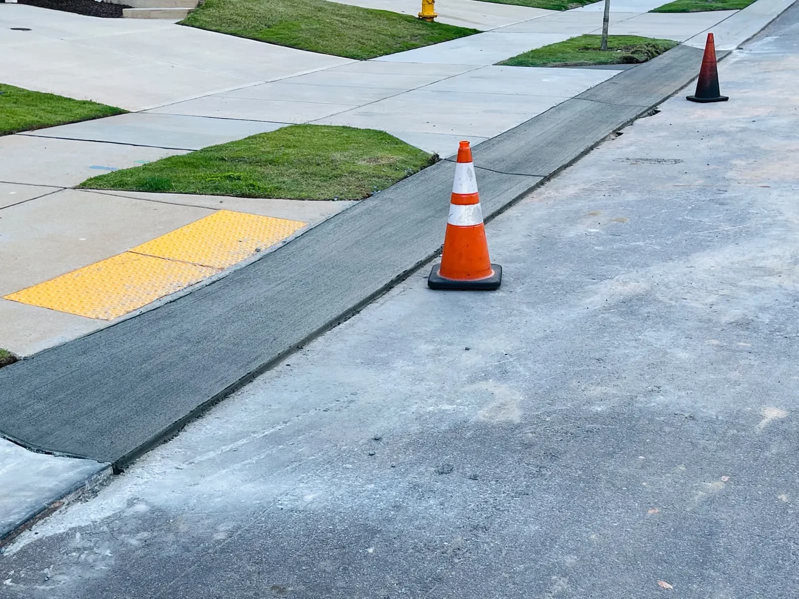 Replaced section of concrete sidewalk and curb